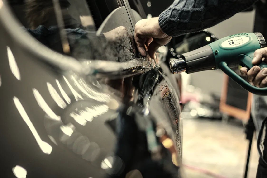 Close detail of a finished tinted window edge